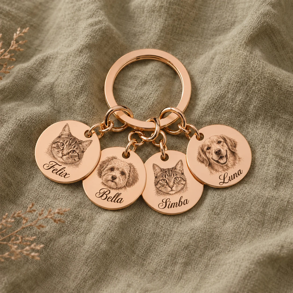 Rose gold keychain with portraits of four pets: Felix, Bella, Simba and Luna