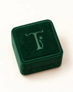 Closed dark-green Treuespur jewelry gift box with logo